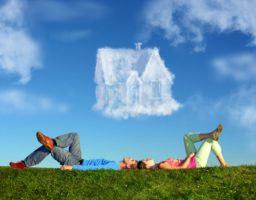 Man and Woman Laying  On Grass Dreaming of a Home 
