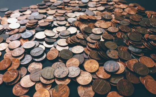 Coins spread across a table
